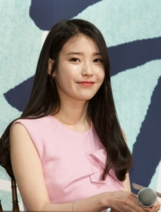 IU from 'THE Producer' Said "I Had My Friends of Girl Groups as Role Models"